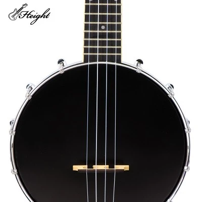 Close-up of the banjo's top, highlighting the sleek black drum skin and the intricate details of the bridge and strings. Close-up of the banjo's top, highlighting the sleek black drum skin and the intricate details of the bridge and strings.